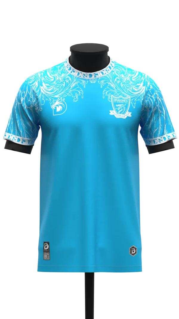 CAMISETA BLANCO Y CELESTE HOJAS